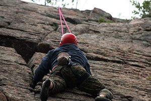 An image of a rock climber on a rock wall.