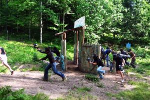 An image of a group of people playing paint ball.