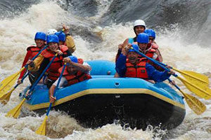 An image of a group of white water rafting.